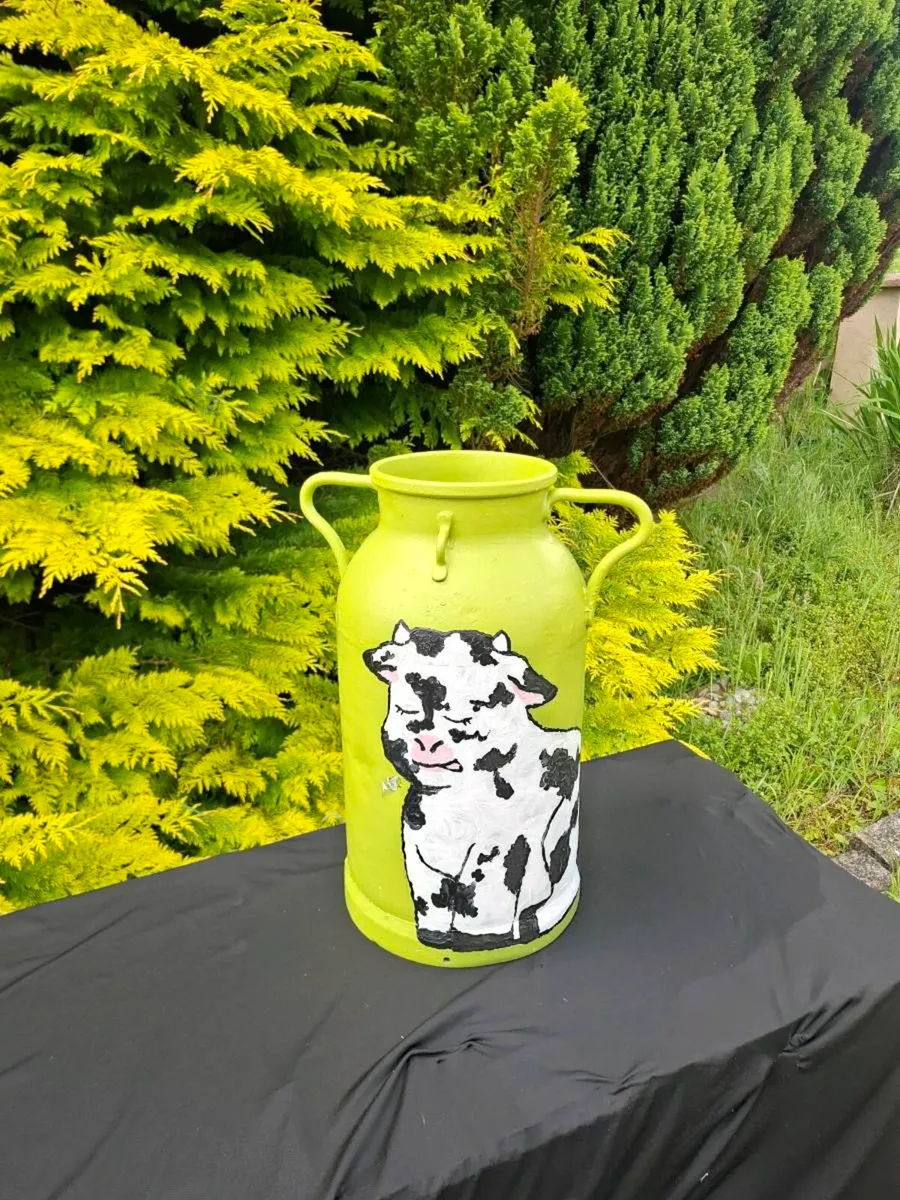 Cow milk churn  umbrella holder