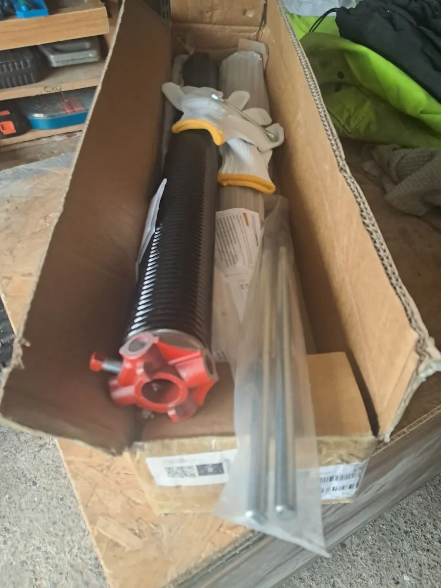 Over head garage door torsion spring pair - Image 1