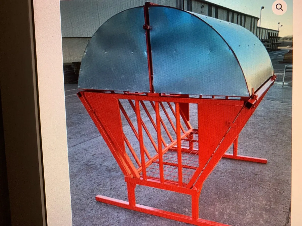 Covered calf hay feeder. 20 ft trough. - Image 1