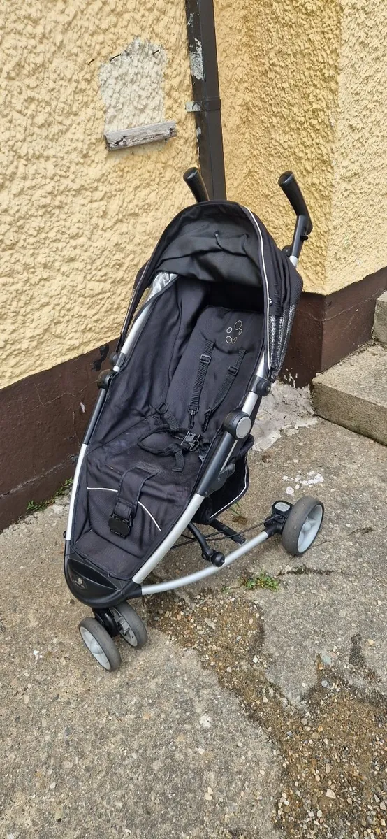 Stroller - lightweight, wide seat with raincover