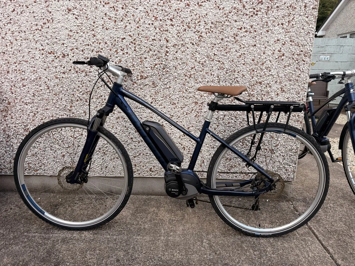 2x Bosch Motor Carrera Crossfuse Electric Bikes - Image 1