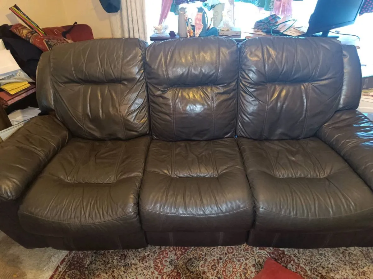 Three seat Chocolat brown electric  recliner DFS. - Image 1