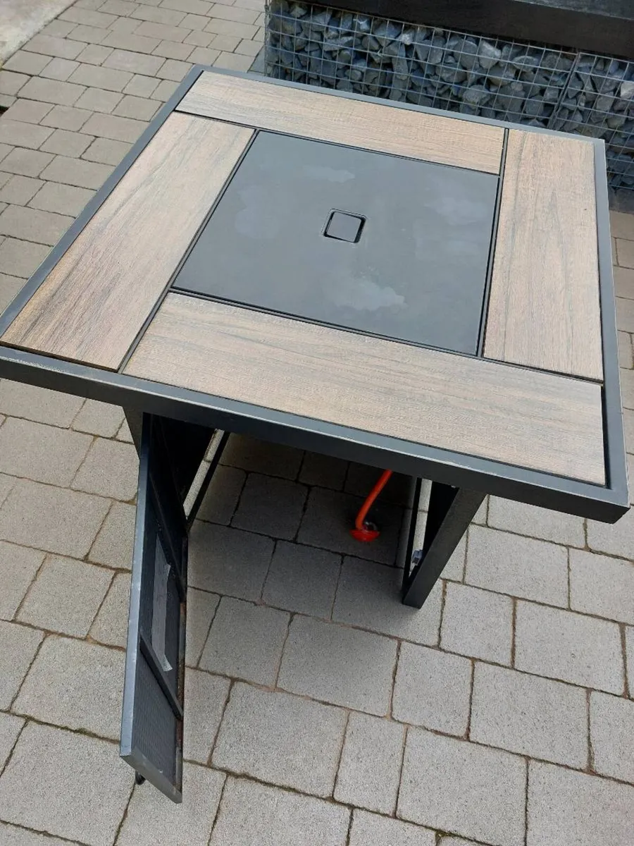 Patio table with gas burner - Image 1