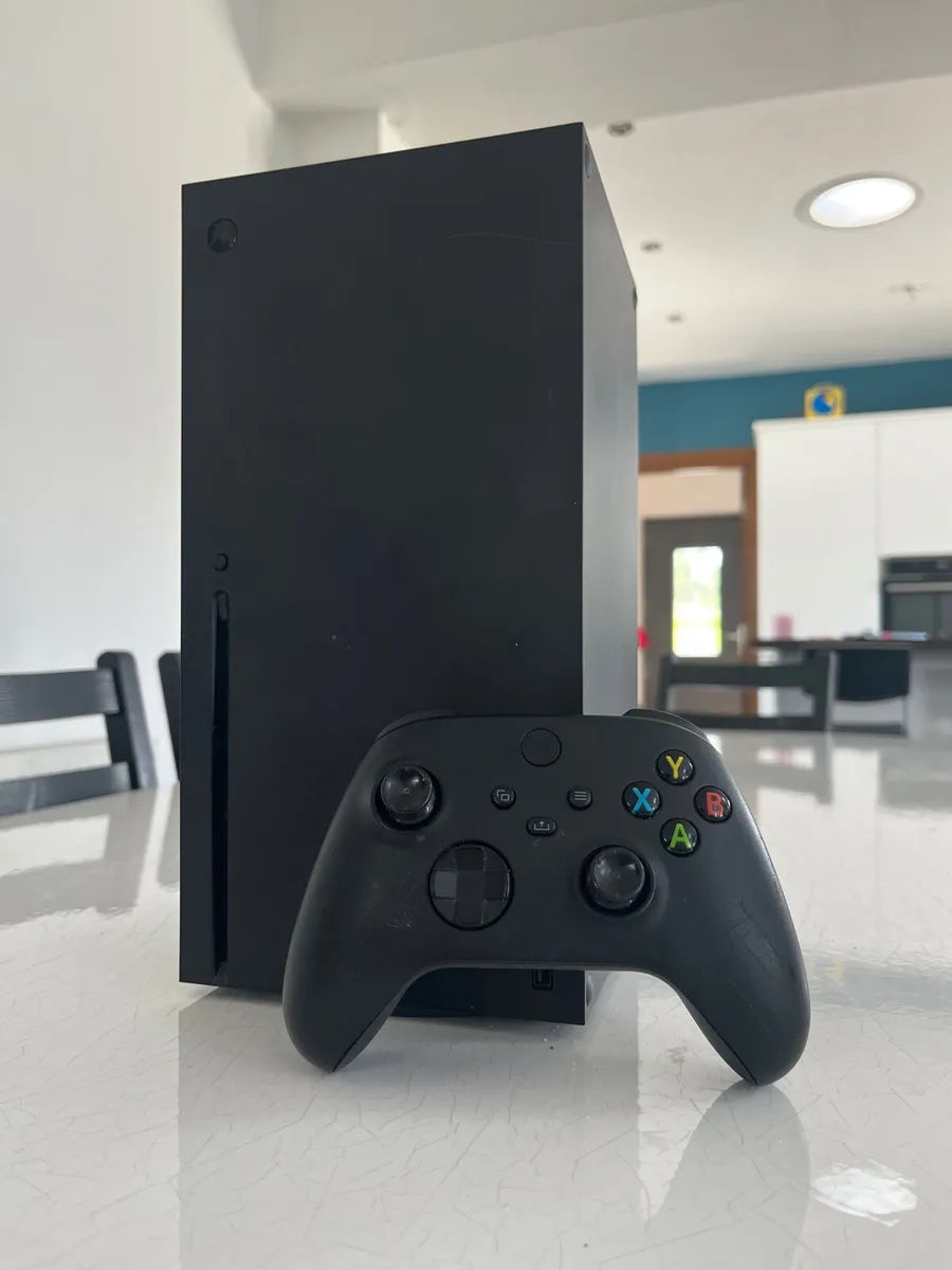 Xbox Series X with controller and power chord - Image 1