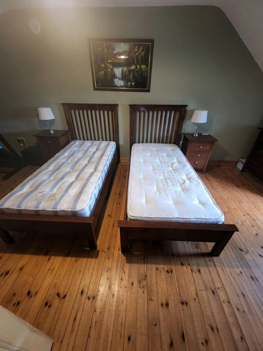 2 single beds with mattresses - Image 1