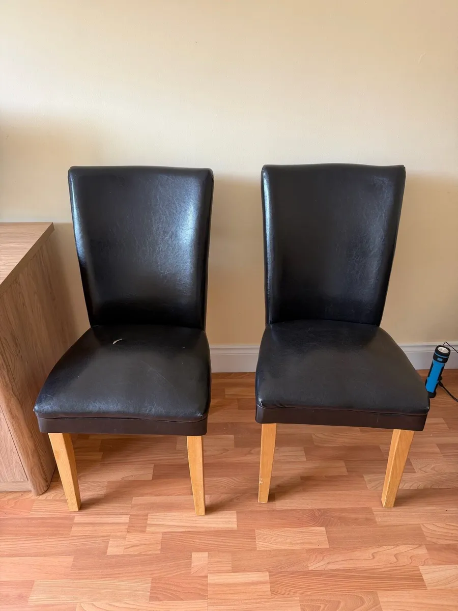 Two leather chairs with solid oak legs - Image 1