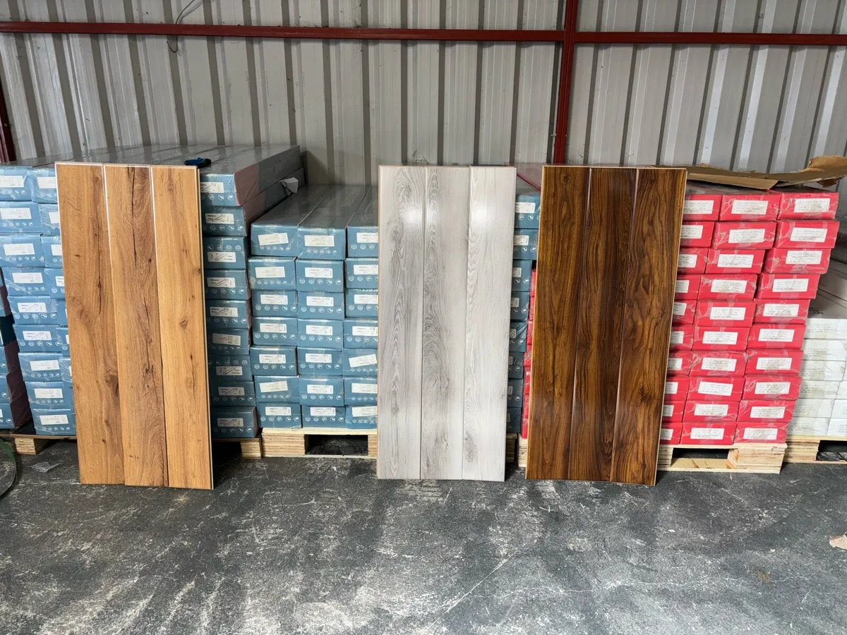 Brand new 12mm high gloss flooring - Image 1