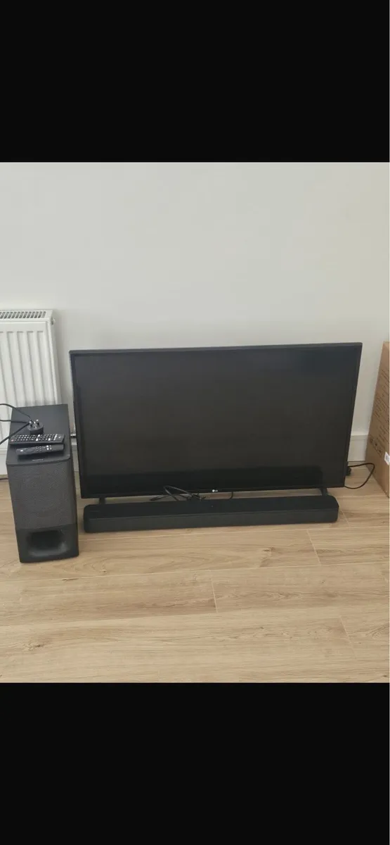 LG 42” UHD TV and Sony Cinema system - Image 1