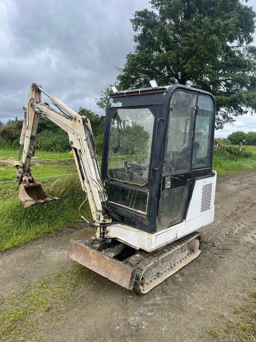 1.7 Tonne bobcat mini digger and trailer - Image 1