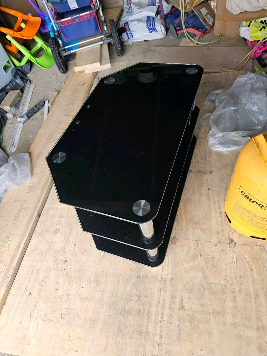Black glass TV stand - Image 1