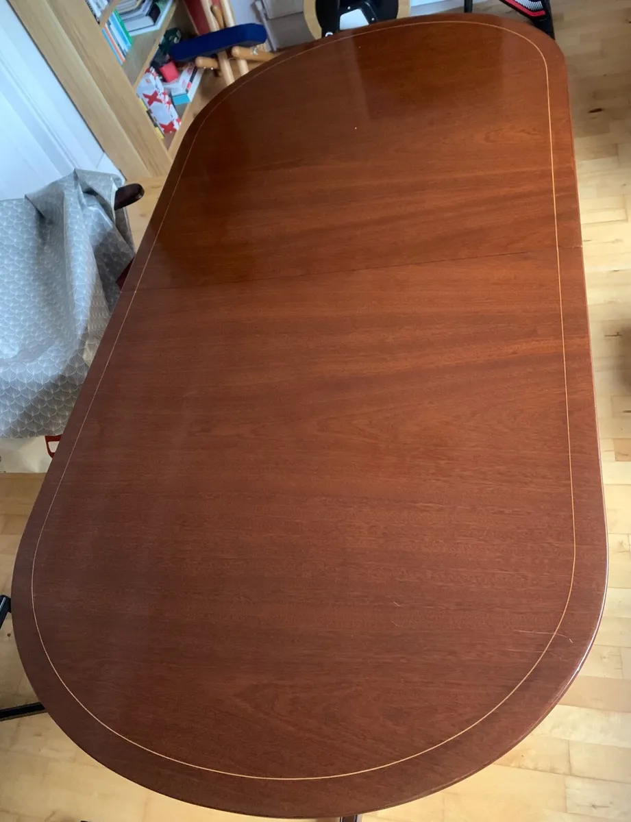 Antique mahogany dinning room table and chairs. - Image 1