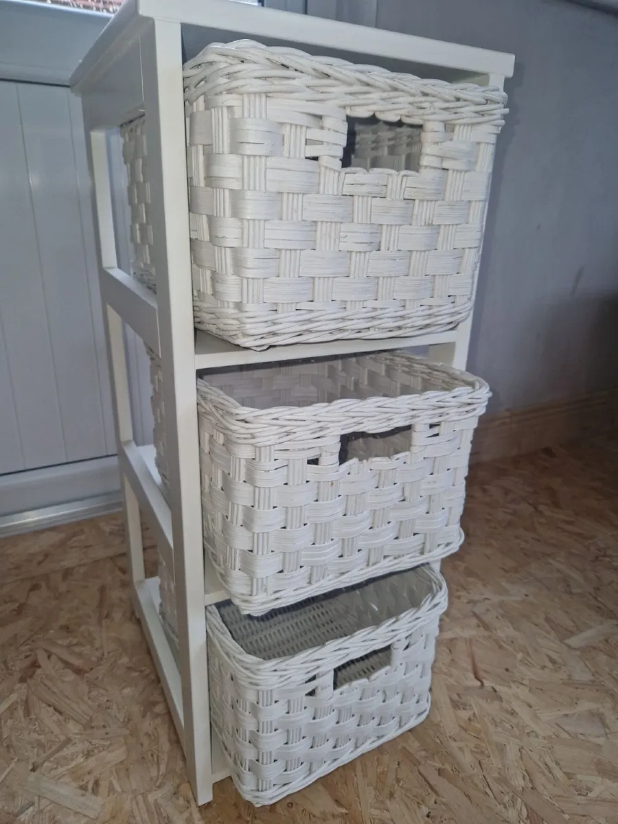Storage stand with 3 baskets