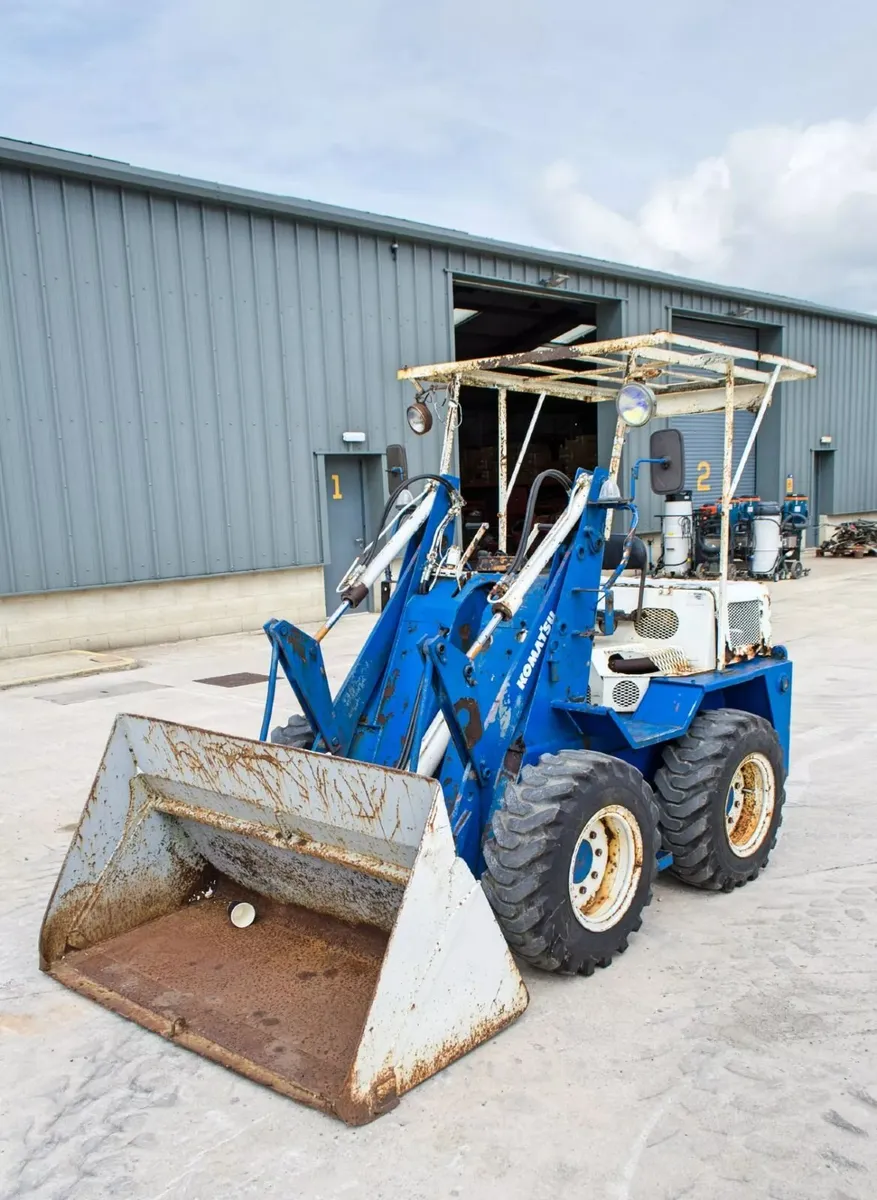 Komatsu SK07 diesel skid steer loader - Image 1