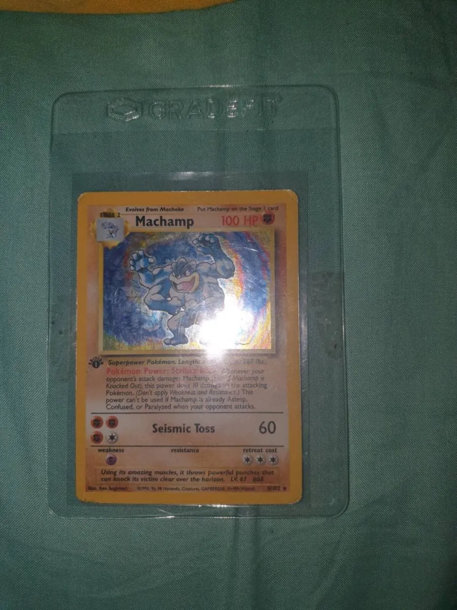 1ST EDITION 1999 MACHAMP HOLOGRAPHIC CARD