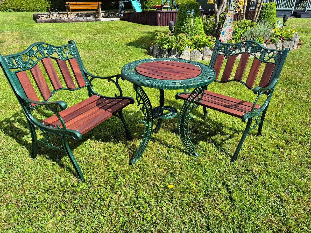 Cast iron table and chairs ( Teak ) - Image 1