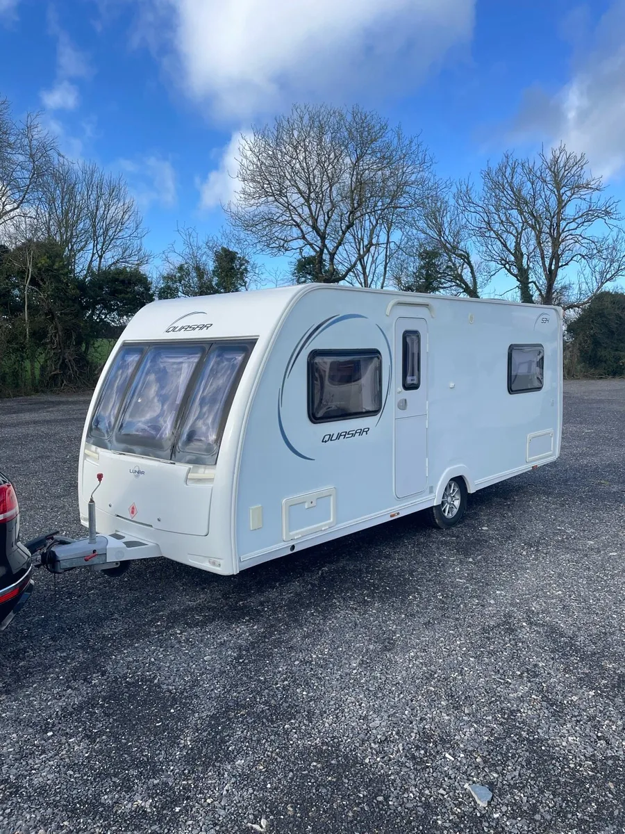 2014 Lunar Quasar 4 Berth Fixed Bed Caravan - Image 1