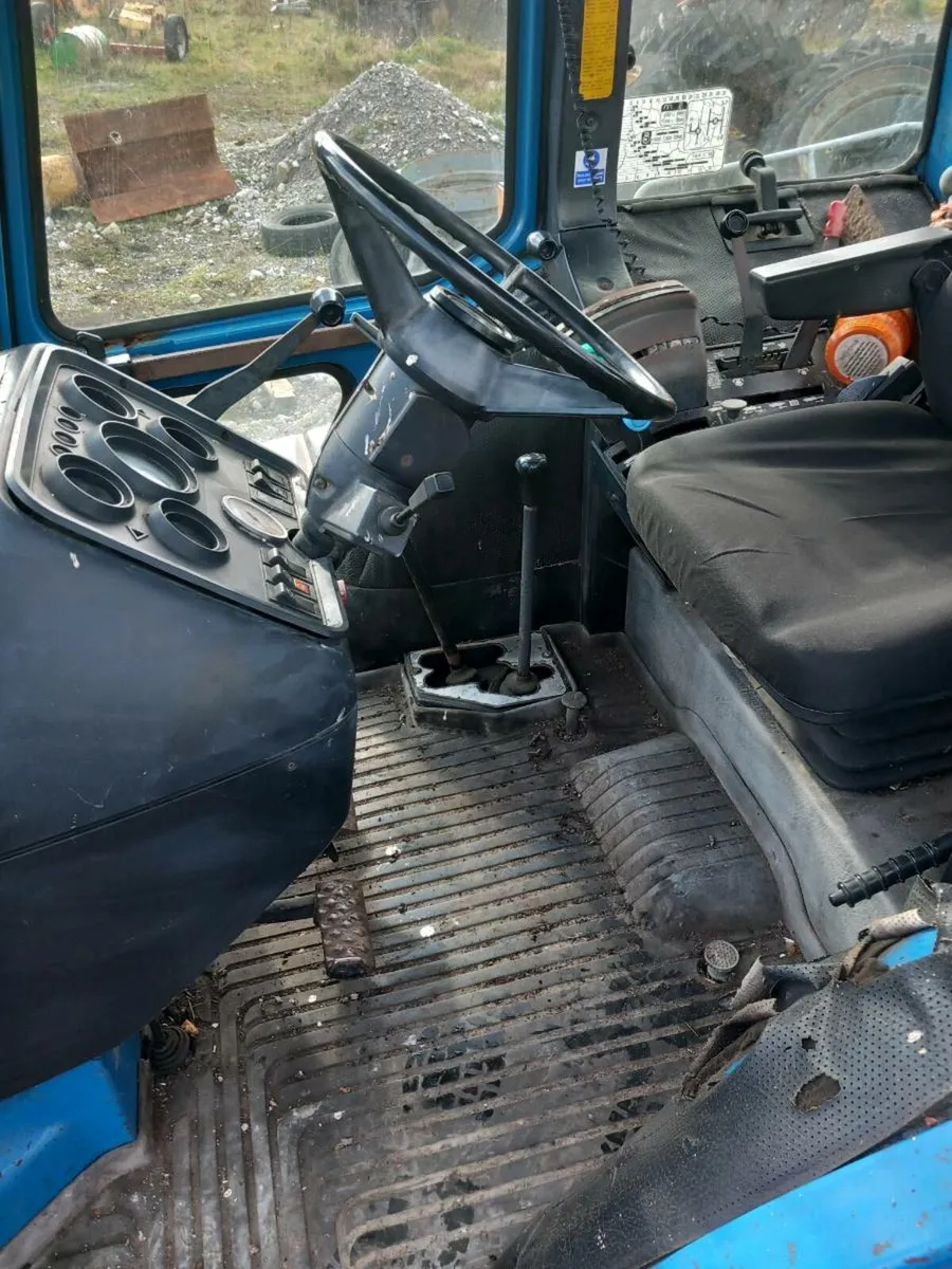 Tractors on tracks. - Image 1