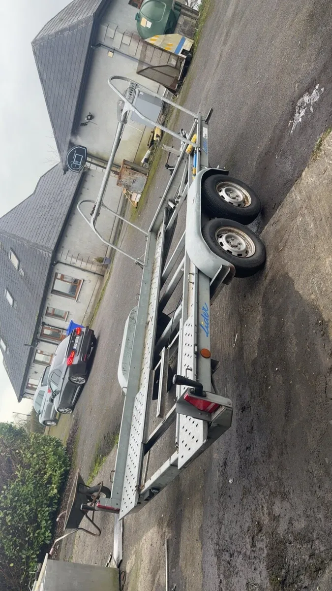 Lider Trailor WIth Tire Rack - Image 1