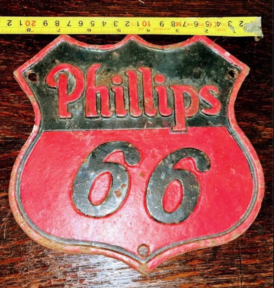 Vintage cast iron sign