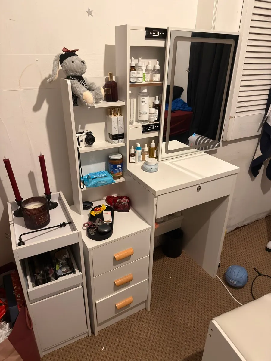 White vanity with mirror and narrow bedside table - Image 1