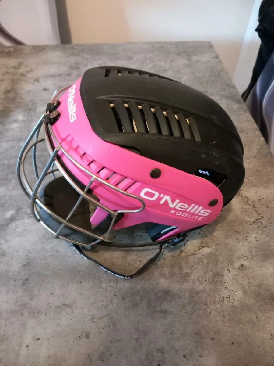O Neil's medium size hurling helmet. - Image 1