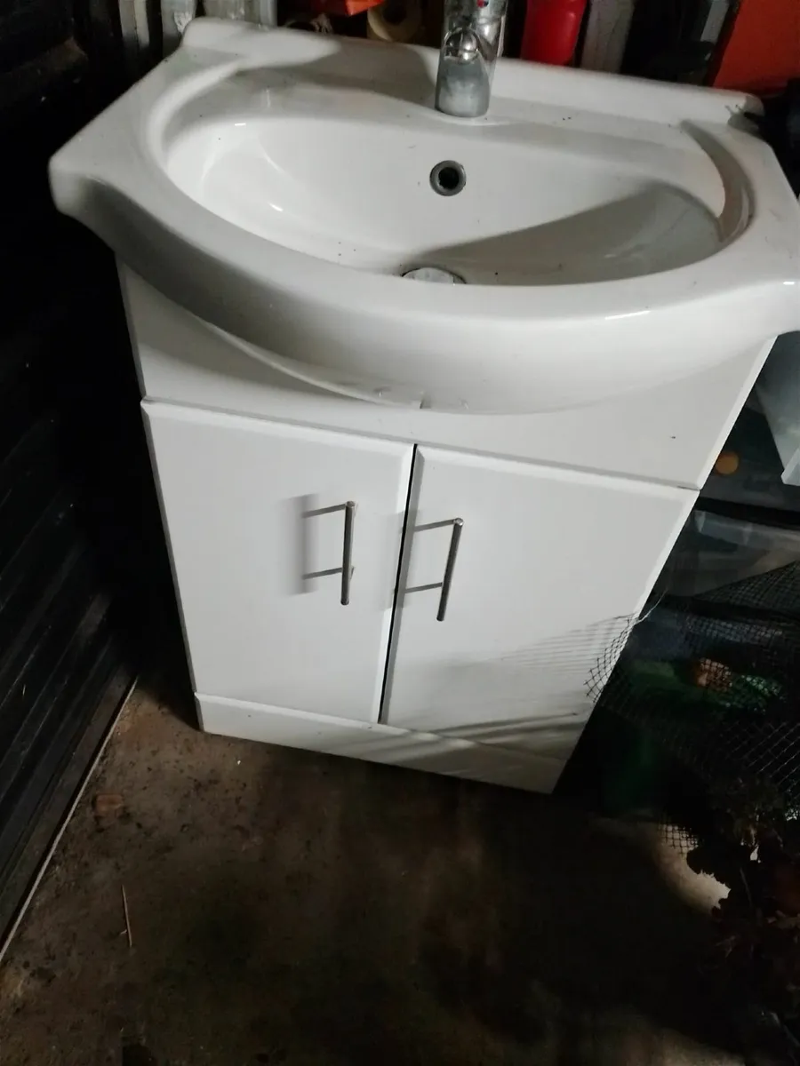 Bathroom sink with cabinet