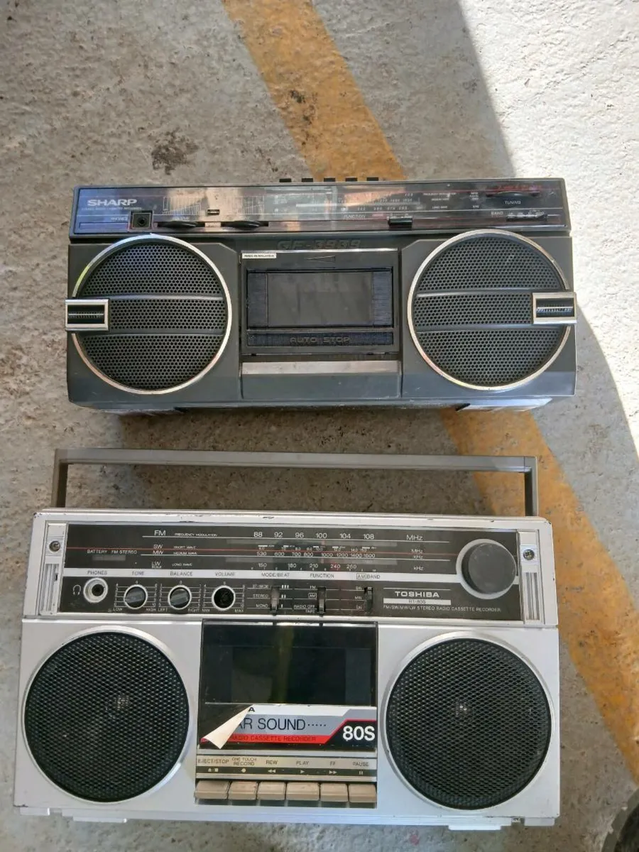 Two vintage red radios