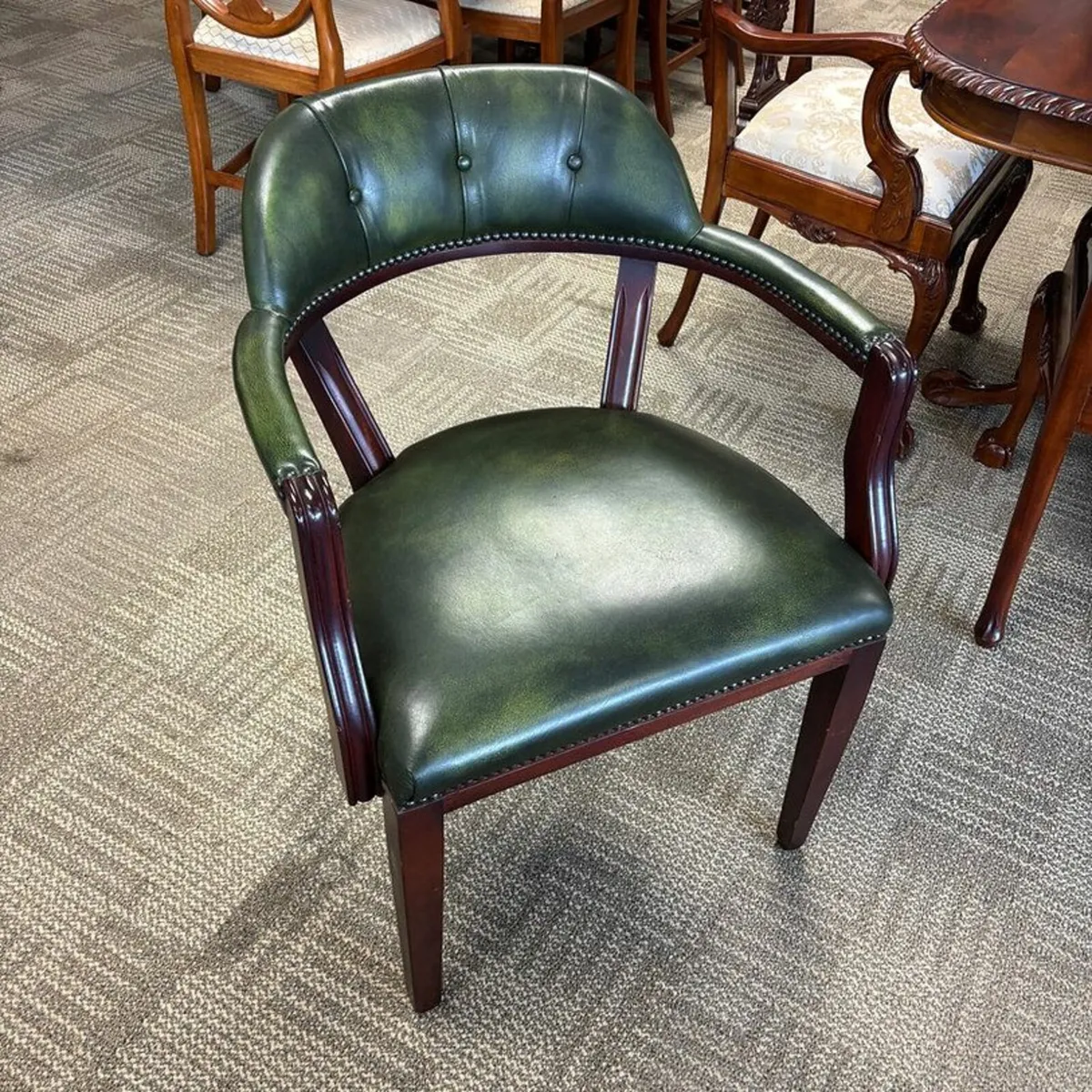 Green leather captains style occasional desk chair