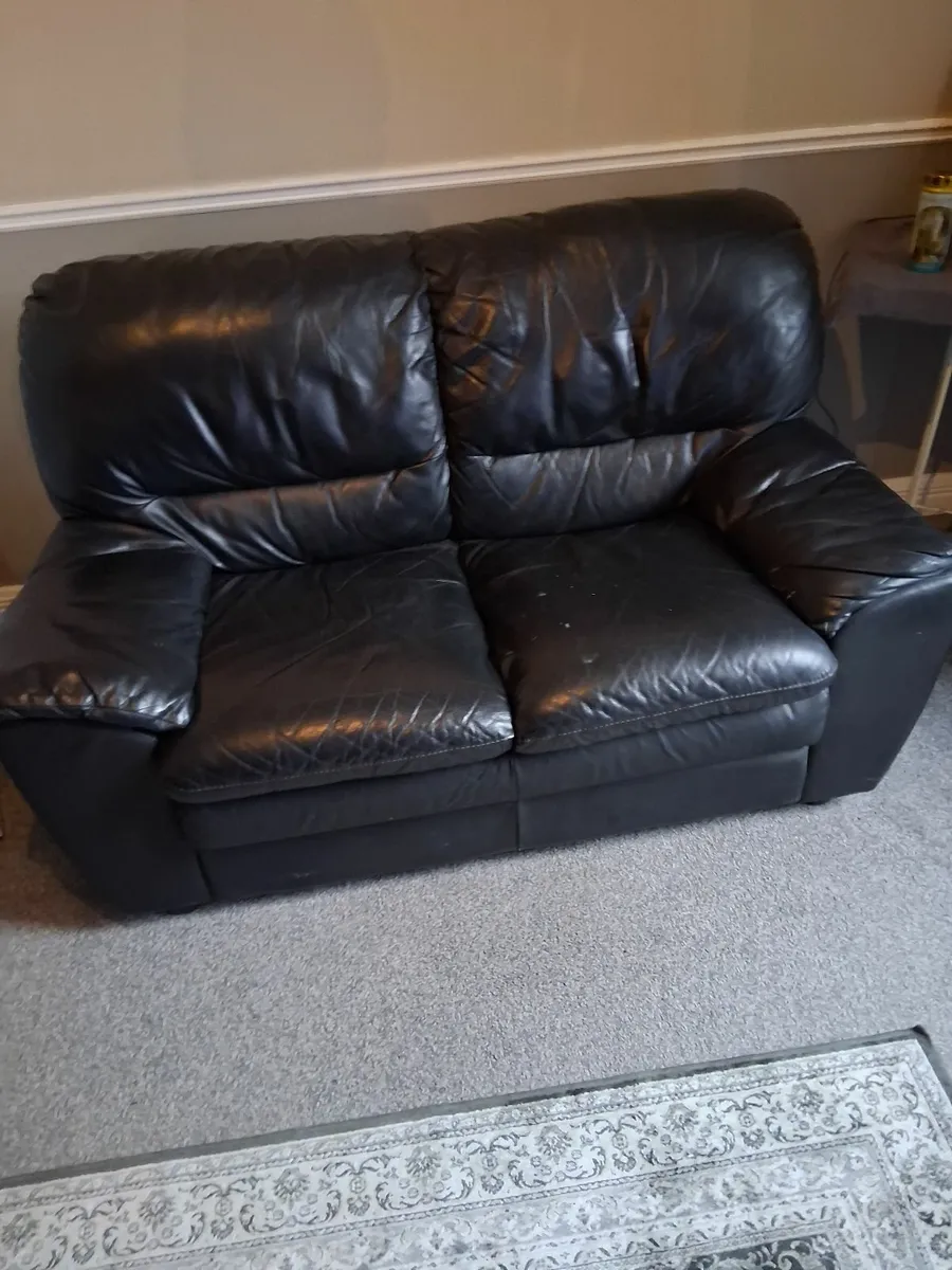 2 seater black leather plus 1 seater recliner. - Image 1