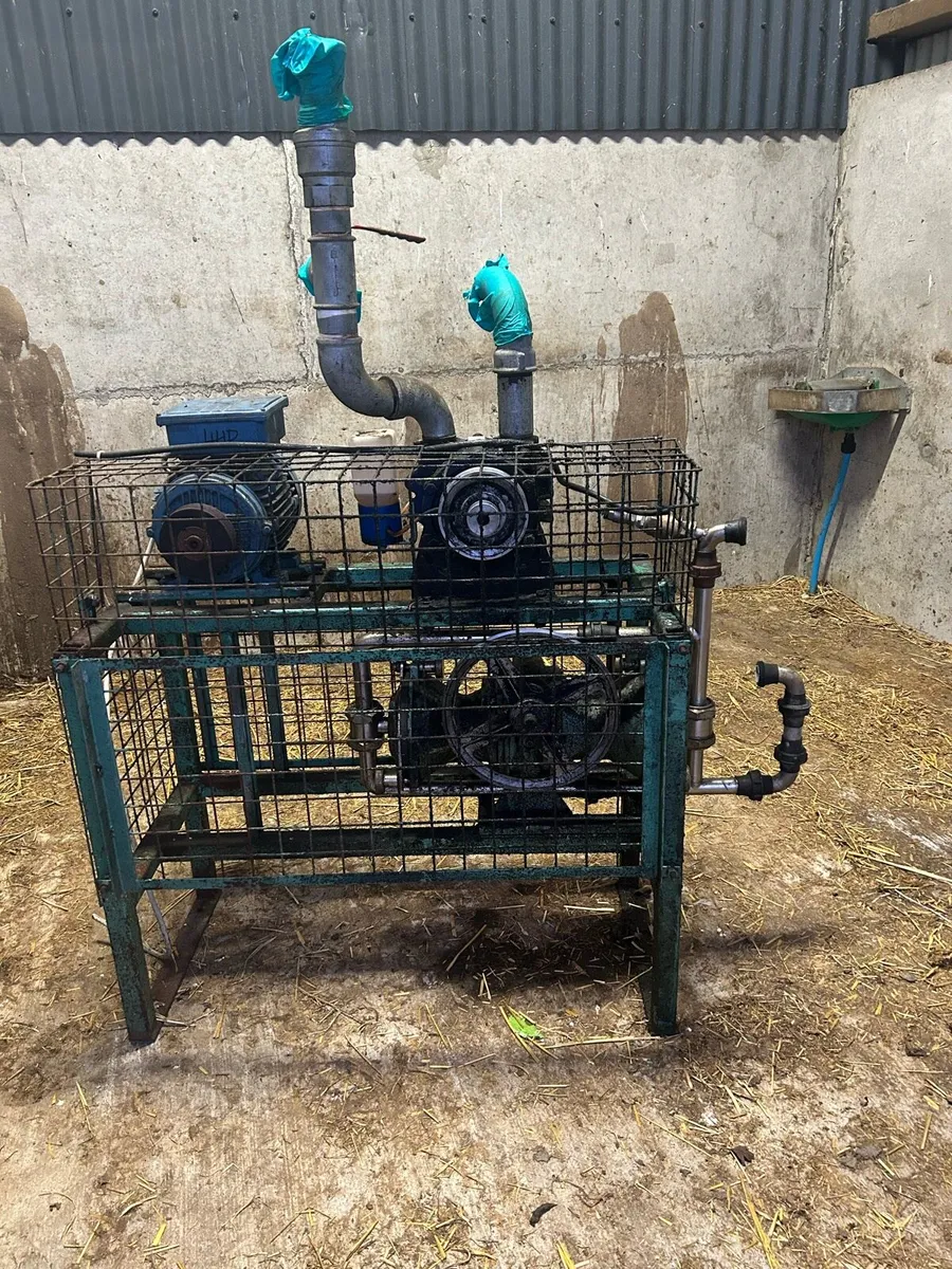 Vacuum pump and milk jars - Image 1