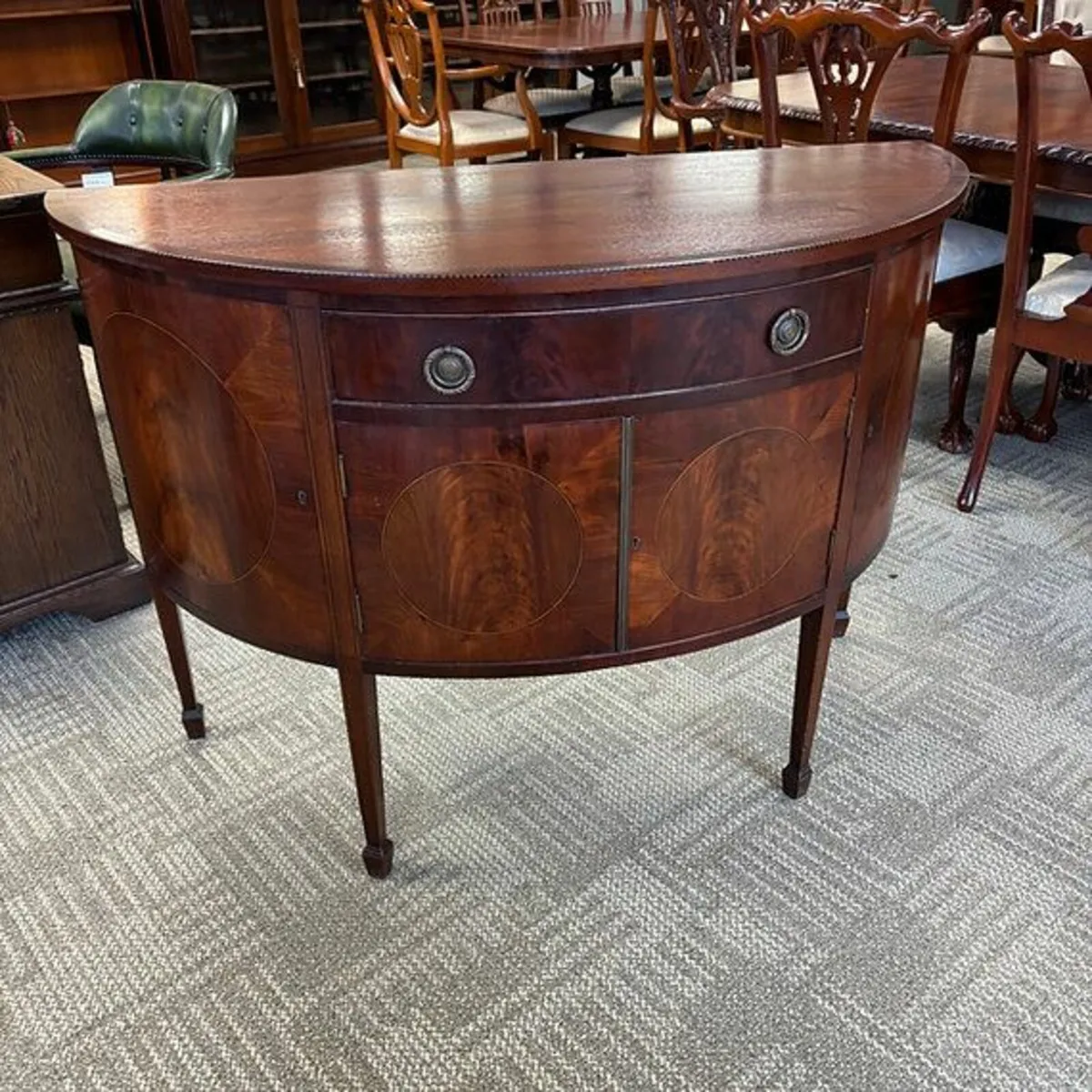 Fabulous Edwardian mahogany flamed demi lune sideb