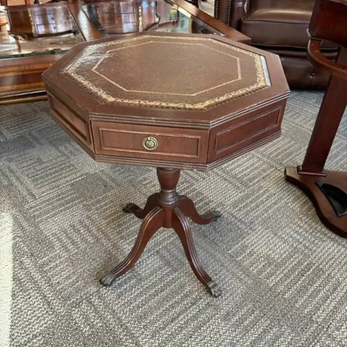 Octagonal occasional table on tripod base with two