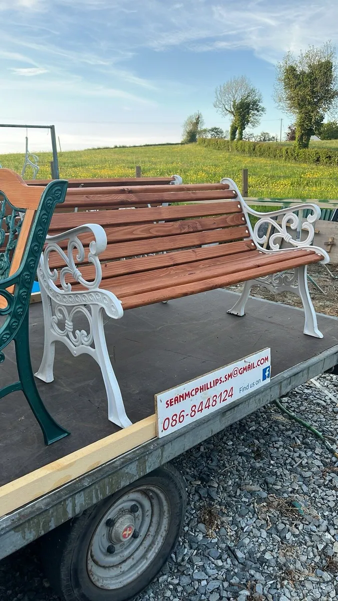 Raised beds bird feeders and cast iron benches - Image 1