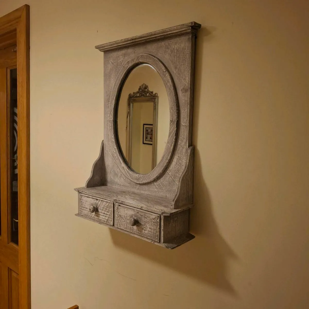 vintage-style oval wall mirror with drawers - Image 1