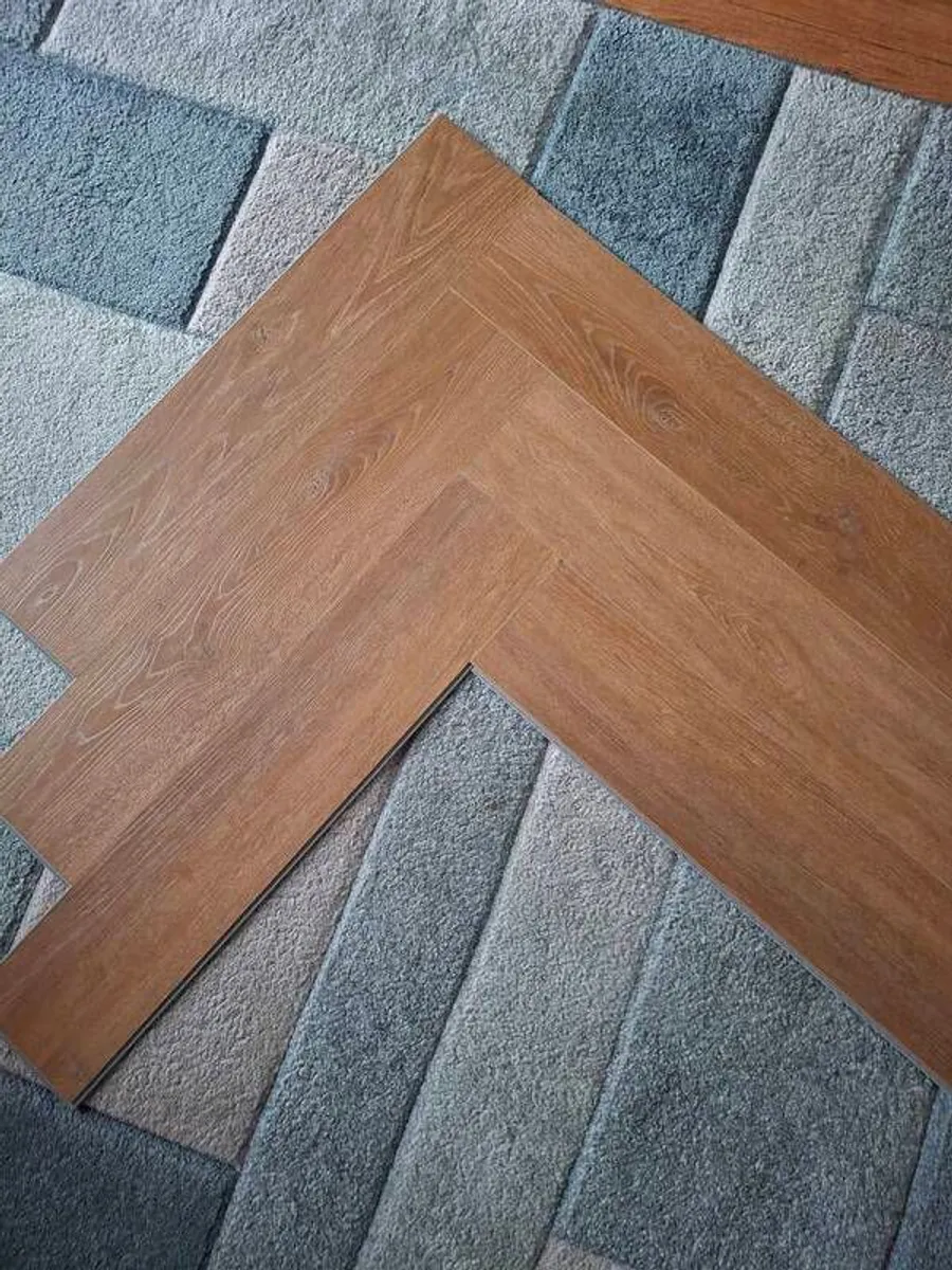 New boxed Herringbone laminate flooring - Image 1