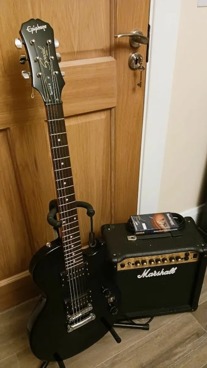 Electric Guitar with Amplifier - Image 1