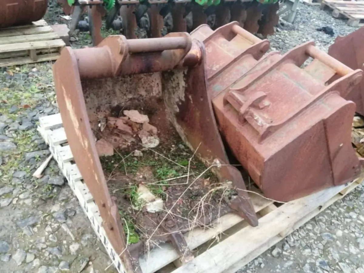 Selection of digger buckets in the yard - Image 2