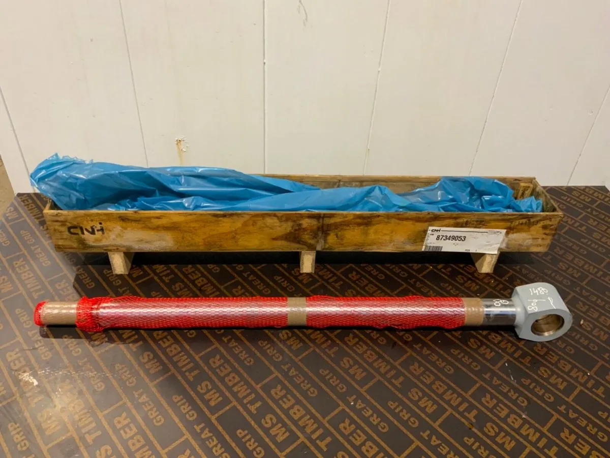 UNUSED NEW HOLLAND CHROME ROD.....87349053 - Image 1