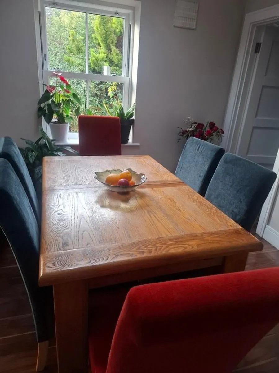 Dinning table and 6 chairs and a small side Table - Image 1