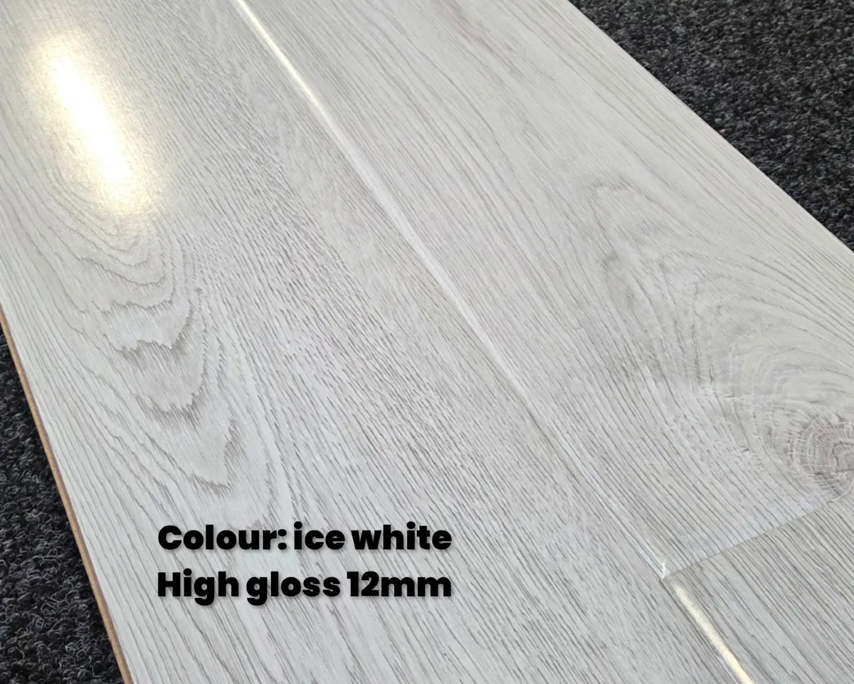 12mm laminated click flooring - pricedrop - Image 1