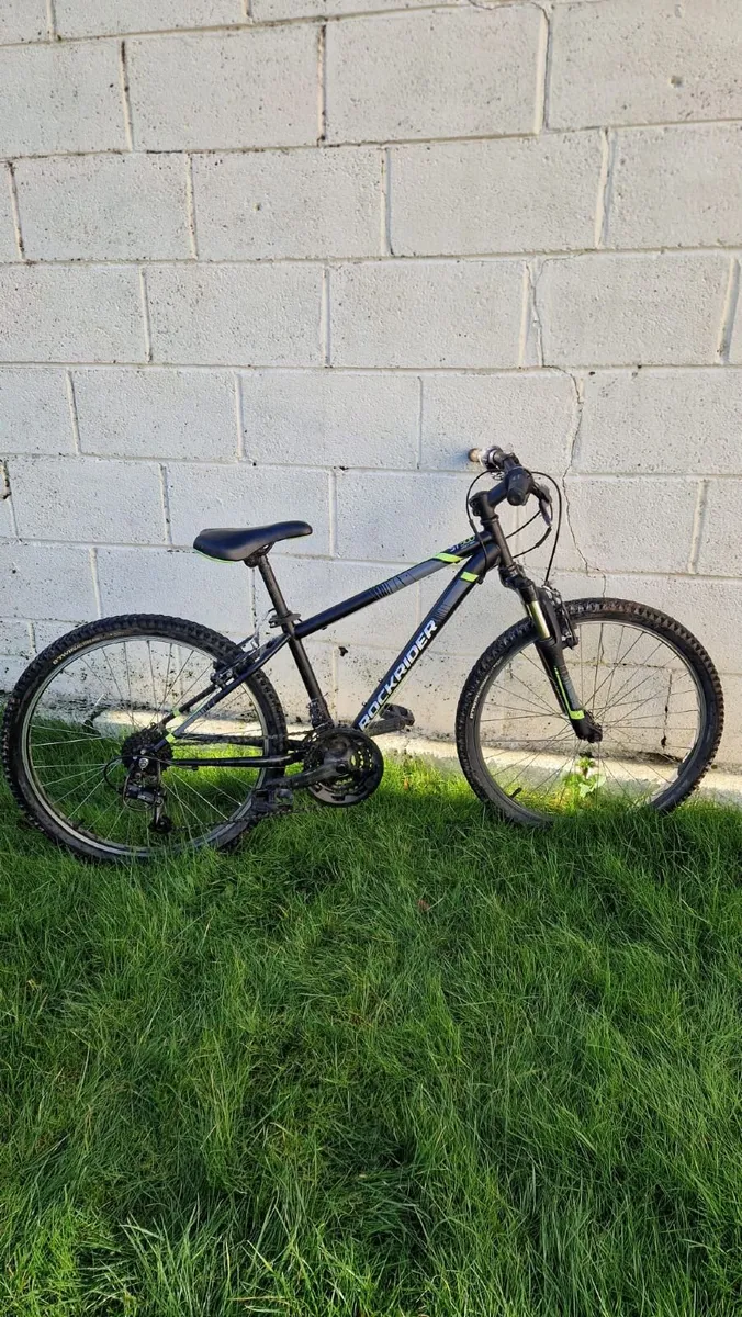 24 INCH KIDS MOUNTAIN BIKE ROCKRIDER ST 500 9-12 Y - Image 1