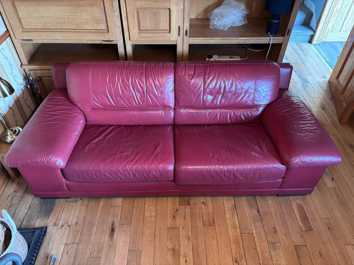Genuine Italian red leather sofa bed - Image 1