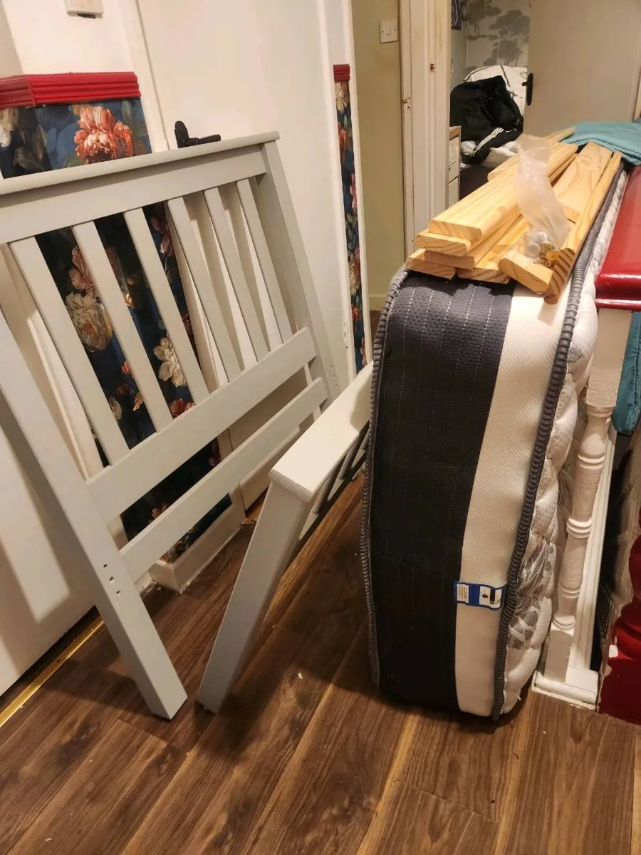 2 single beds, one grey, one white, matresses - Image 1