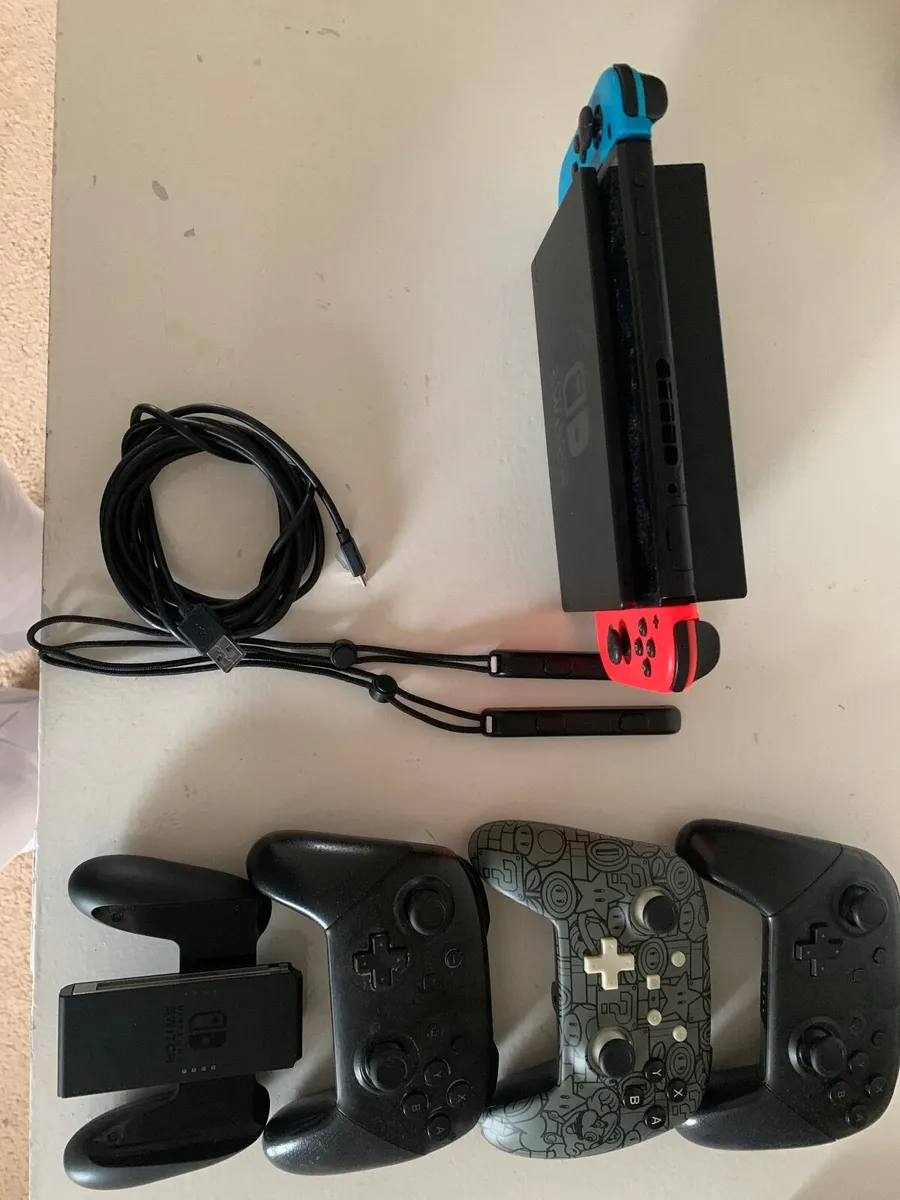 Nintendo Switch with pro controllers - Image 4
