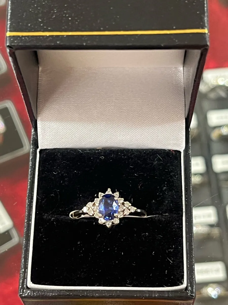 9k gold ring with sapphire and diamonds. - Image 1