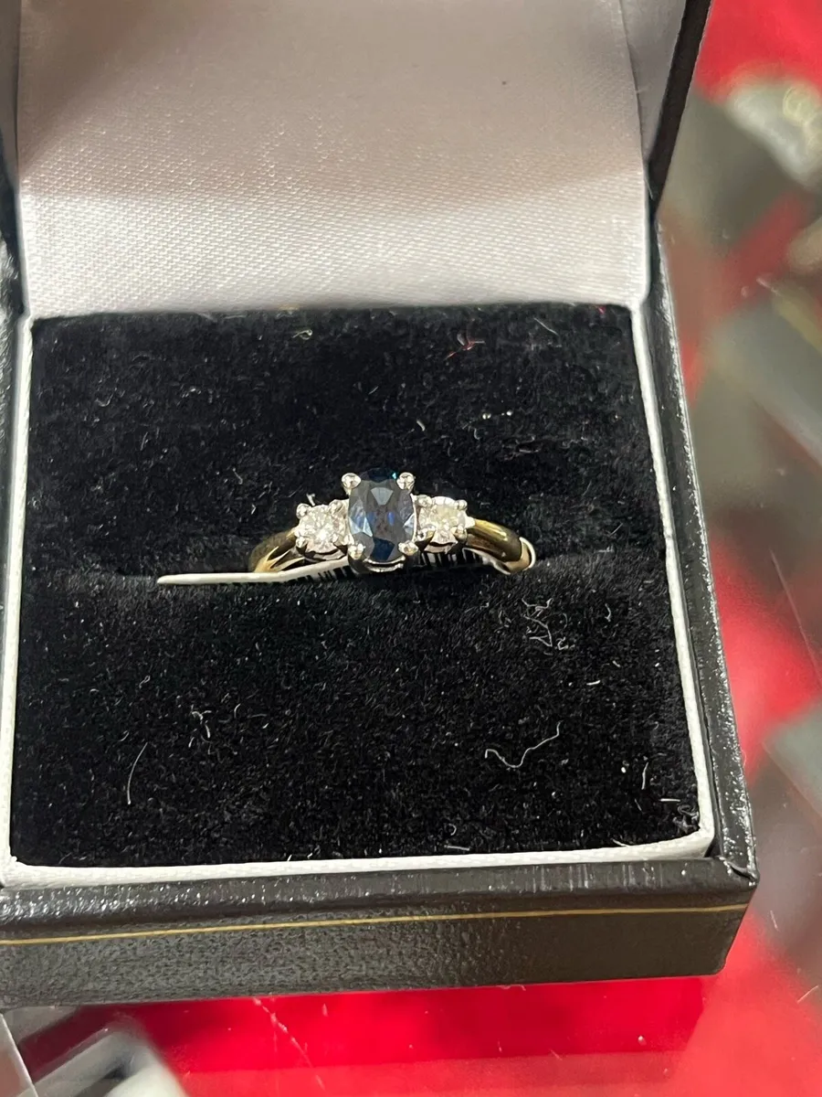 9k gold ring with sapphire and diamonds. - Image 1