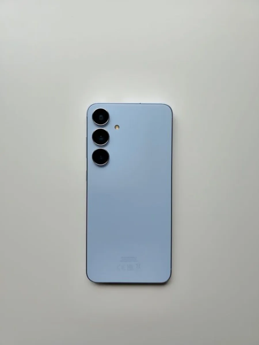 Samsung S24+ (Plus) with 2 cases and Anker charger - Image 1