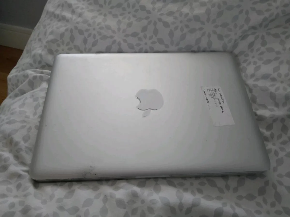 Two MacBook Pro Laptops - Image 1