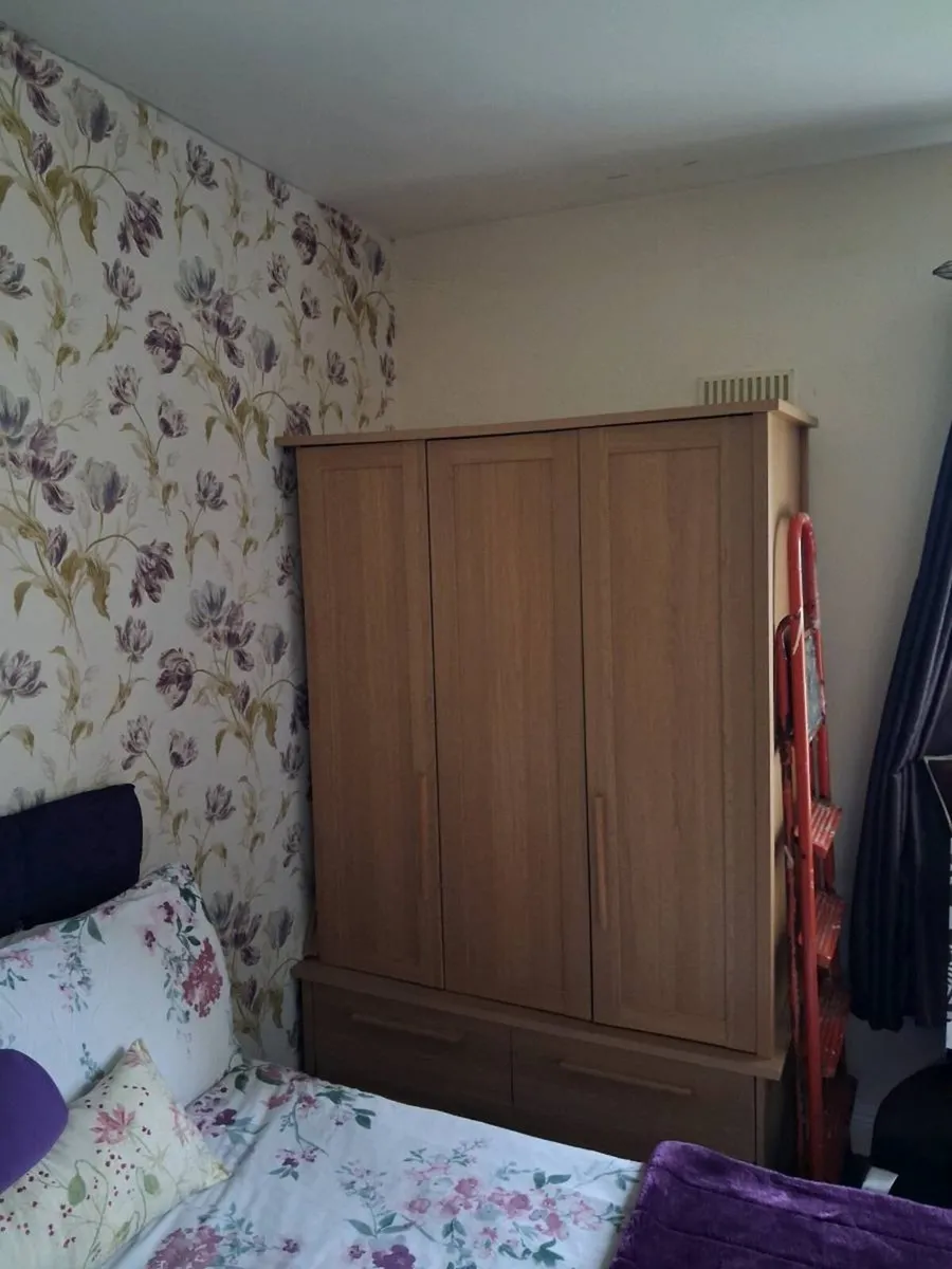 Treble Door Wardrobe with Four Drawers Below - Image 1