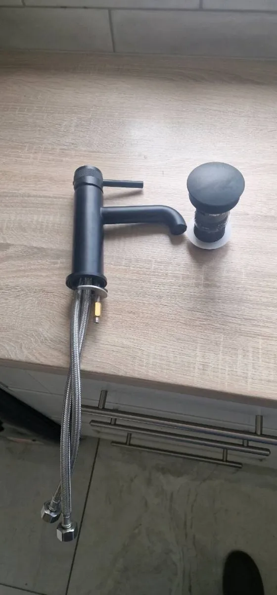 Aqualla Baisin mixer tap and waste - Image 1